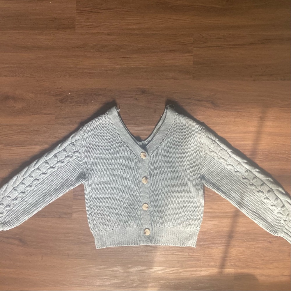 Jessica Simpson cropped, blue, slouchy, knitted sweater.